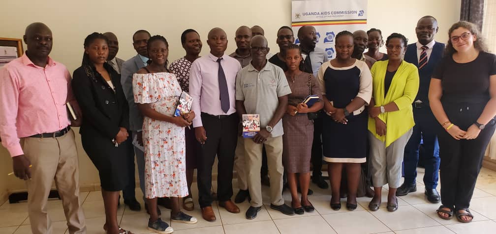 Uganda AIDS Commission in a follow-up meeting on Dissemination of HIV prevention and control messages at the District.
UAC disseminated HIV Prevention and Control messages through the forum of RDCs and RCCs which was identified as an effective communication channel to government programs.
UAC has purposely visited the district to find out on:-
- How many Radio talk shows have been conducted
- How many district AIDS Coordination Committee meetings have been held.
- If the district has allocated the 0.1% of the District budget for HIV mainstreaming
- How many NGOs and CBOs are doing HIV work in their locality. Uganda AIDS Commission officials with district officials and other stakeholders posing for a photo.